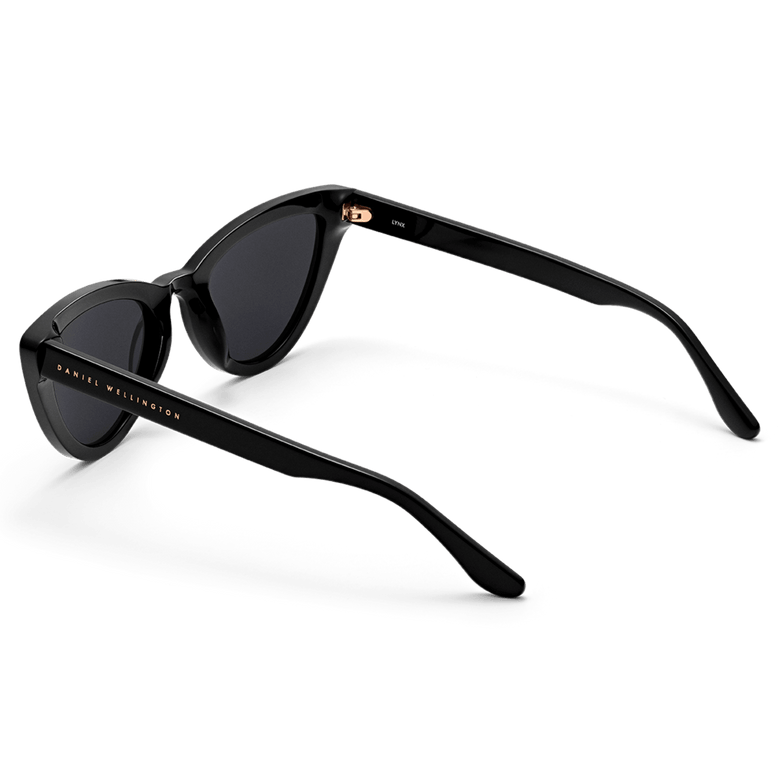 Lynx Bio-Acetate Black sunglasses with a sculpted cat eye frame, dark lenses, and Daniel Wellington branding along the sleek black temples.