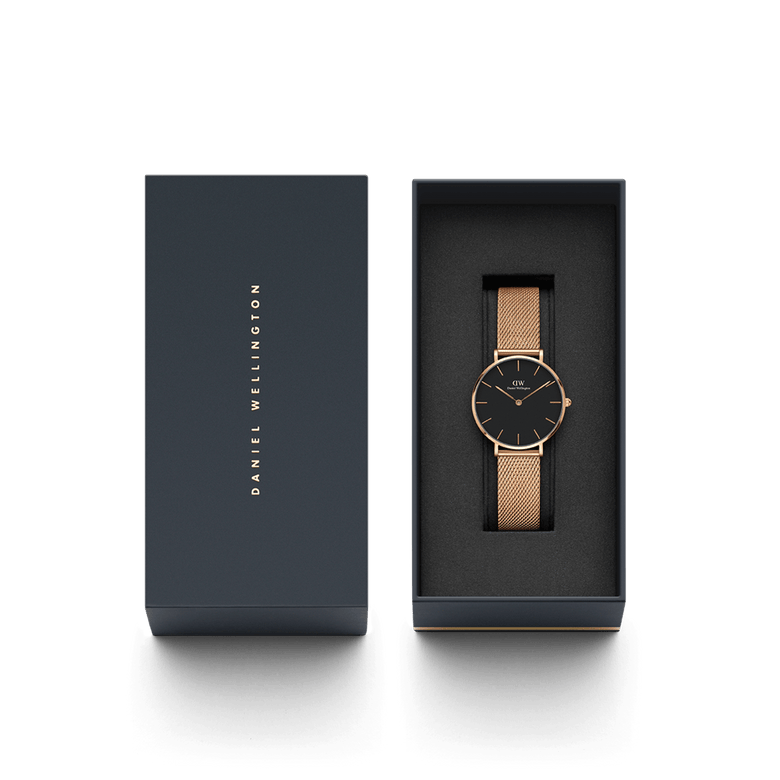 Petite Melrose Black Rose Gold watch with a black dial and rose gold mesh strap presented in a sleek Daniel Wellington gift box, ideal for gifting or adding to your collection.