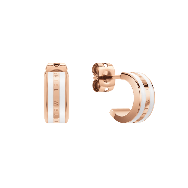 A pair of Daniel Wellington Emalie Earrings in rose gold with a satin white enamel stripe, featuring a minimalist huggie design and engraved branding, shown from both front and side angles.