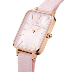 Quadro Coral Pink MoP Rose Gold features a rectangular rose gold case, pink mother of pearl dial, minimalist hour markers, and a soft pink NATO strap, highlighting its refined and feminine design for everyday wear.
