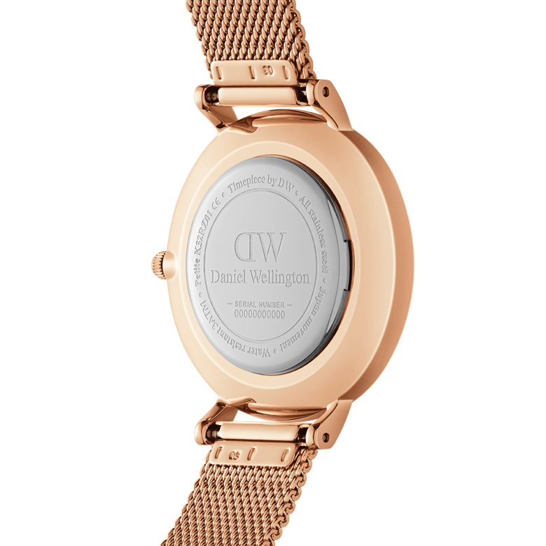 Back view of the Petite Melrose Light Pink Rose Gold watch showing the engraved stainless steel case and rose gold mesh strap with adjustable clasp.
