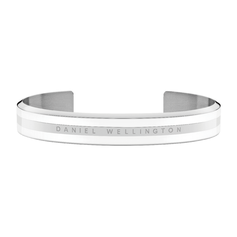 Emalie Bracelet Silver features a minimalist open cuff design with polished silver and satin white enamel, engraved with Daniel Wellington branding for a refined, modern look.