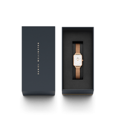 Quadro Lumine Pressed Melrose rose gold ladies watch with a rectangular case and mesh bracelet, presented in a premium Daniel Wellington gift box, ideal for gifting or special occasions.