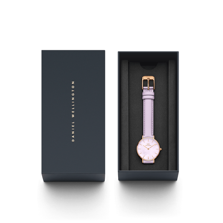 Petite Lavender Rose Gold ladies watch with a pastel lavender leather strap and rose gold case, elegantly presented in a Daniel Wellington branded gift box.