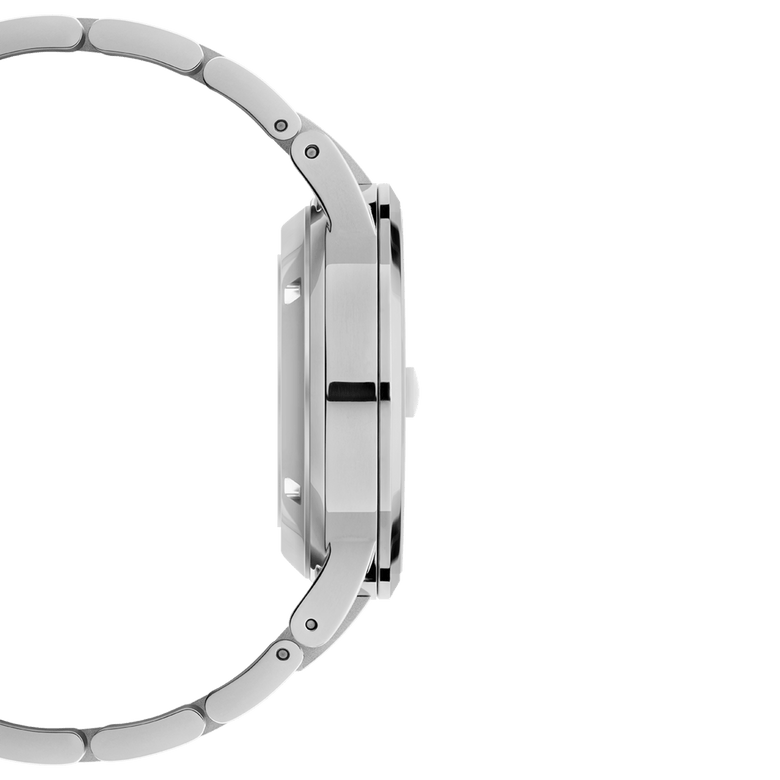 Side profile of the Daniel Wellington Iconic Link Automatic watch, highlighting the slim stainless steel case and integrated link bracelet.