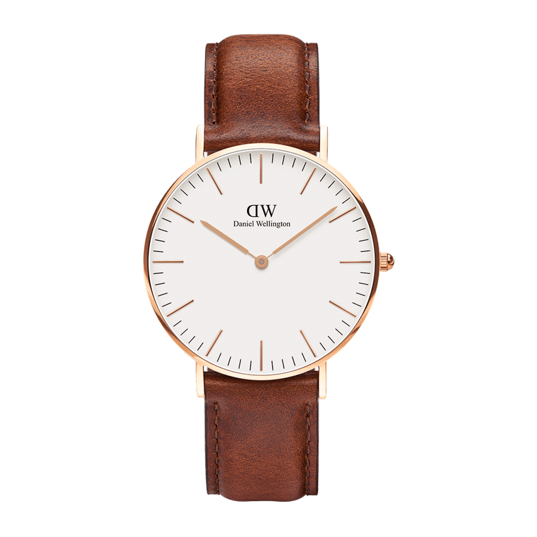Classic St Mawes Rose Gold watch with a round eggshell white dial, slim rose gold case, and a brown genuine leather strap, showcasing minimalist design suitable for everyday wear.