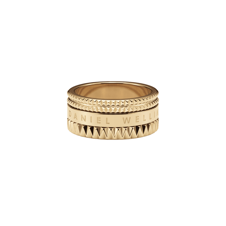 Elevation Ring Gold featuring a bold gold finish, geometric textured edges, and engraved branding, crafted from stainless steel with PVD gold plating.