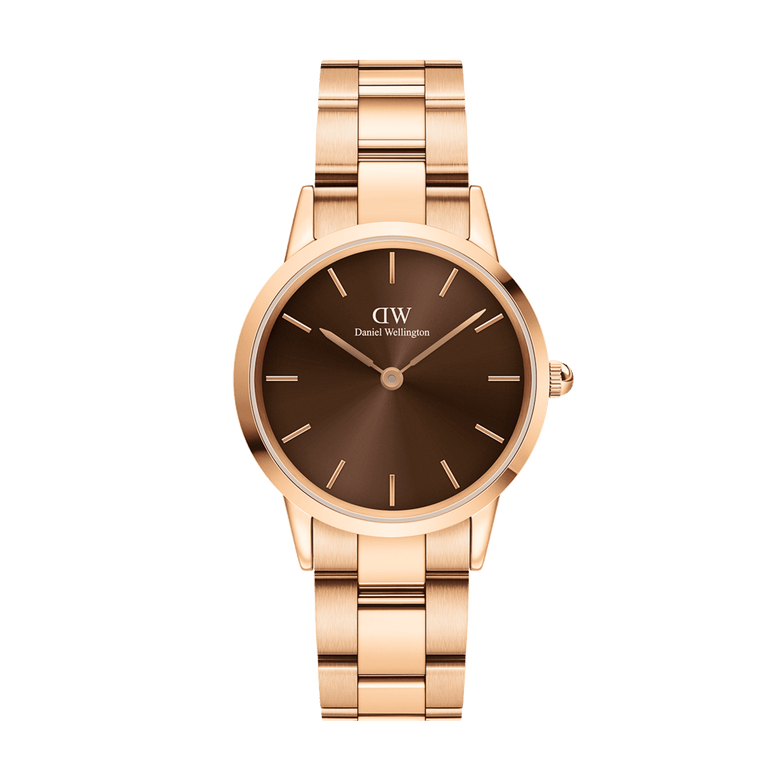 Iconic Link Amber watch by Daniel Wellington with a rose gold stainless steel bracelet and a warm sunray brown dial, featuring minimalist hour markers and a sleek, modern design.