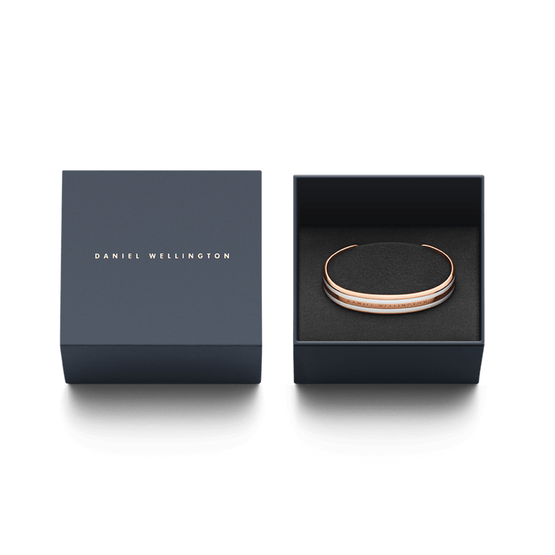Emalie Bracelet Satin White Rose Gold presented in a sleek Daniel Wellington gift box, highlighting its elegant packaging and minimalist cuff design.