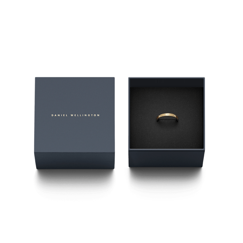 Classic Lumine Ring Gold presented in a sleek Daniel Wellington gift box, highlighting the polished gold band with crystal accents as an elegant gifting option.