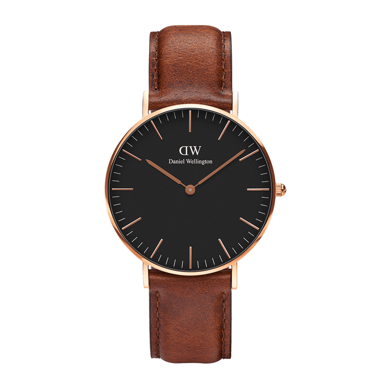 Classic St Mawes Black Rose Gold watch featuring a minimalist black dial with rose gold markers and hands, set in a polished rose gold case and paired with a brown leather strap.