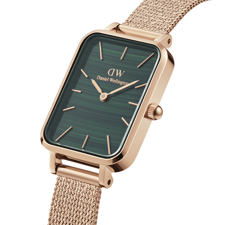 Quadro Pressed Melrose Green Rose Gold watch with a rectangular green dial, rose gold mesh bracelet, and minimalist hour markers, shown in a close-up to highlight its refined design and premium finish.