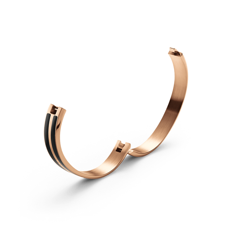 Emalie Infinite Rose Gold Black bracelet shown open, highlighting the concealed closing system and the smooth rose gold and black enamel finish.
