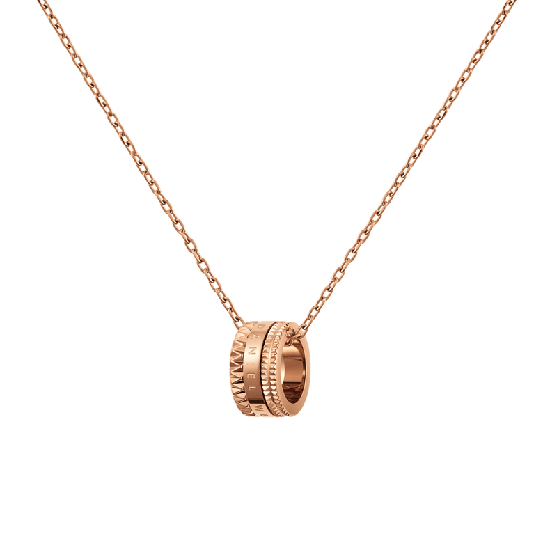 Rose gold Elevation Necklace with a geometric ring pendant featuring intricate detailing and a polished finish, suspended on a fine cable chain.