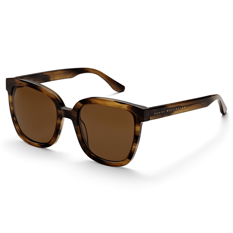 Grande Bio-Acetate Brown Demi sunglasses with a square brown demi frame, amber lenses, and subtle Daniel Wellington branding on the temples, offering a stylish and comfortable fit for women.
