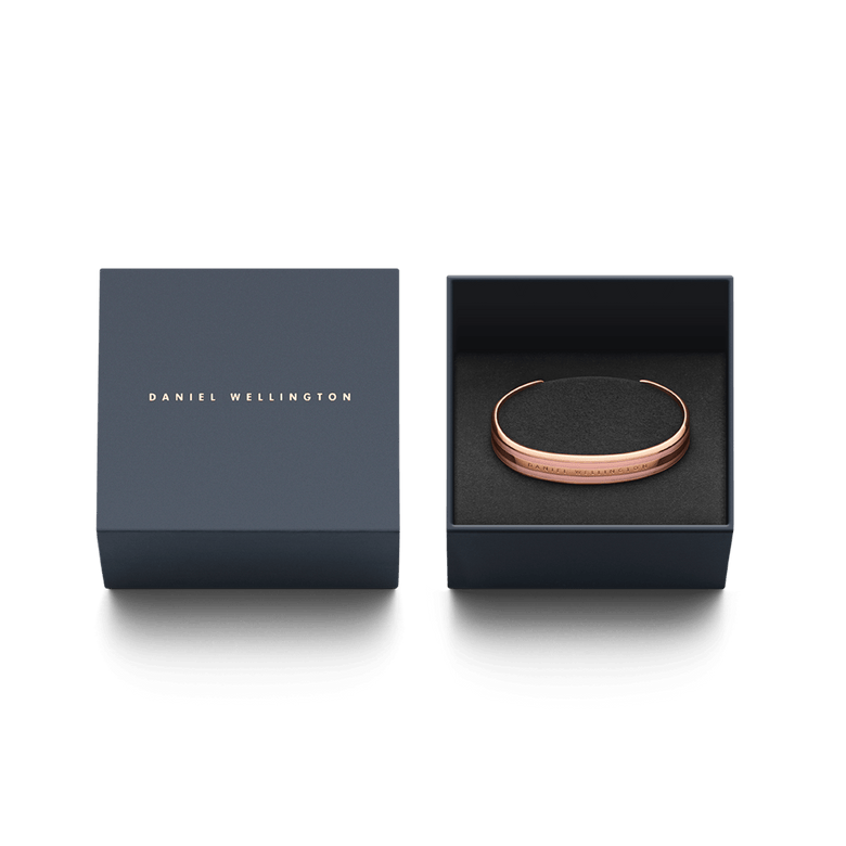 Emalie Bracelet Dusty Rose Rose Gold presented in a sleek Daniel Wellington gift box, highlighting its rose gold and pink enamel cuff design as a stylish jewellery gift option.