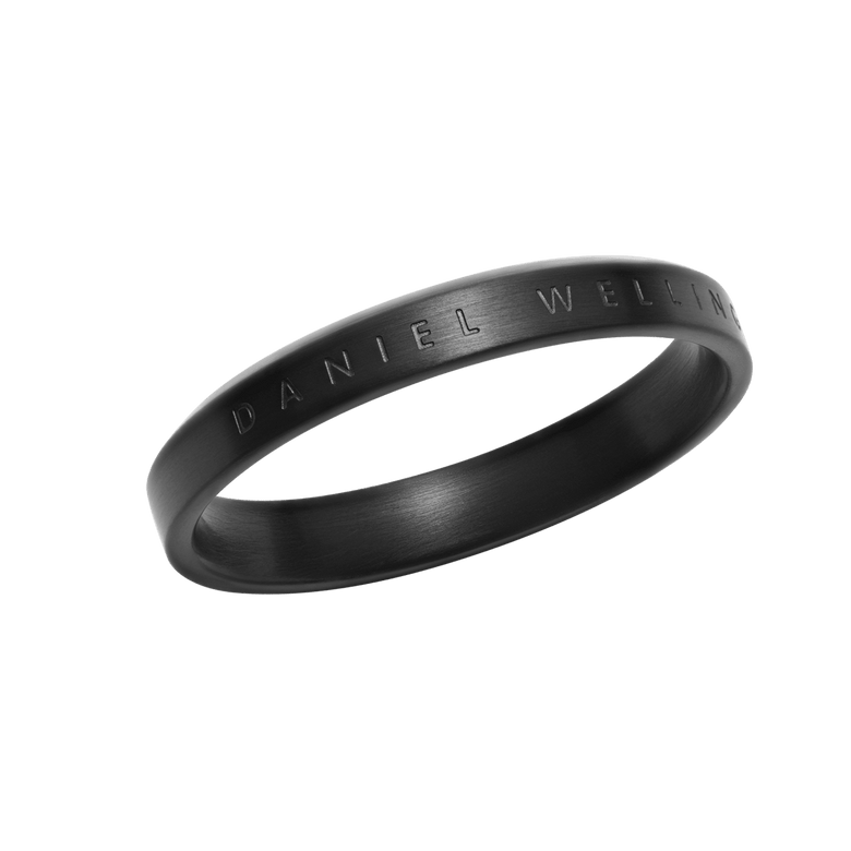 Minimalist Classic Ring Black with a smooth stainless steel band and subtle Daniel Wellington engraved branding, featuring a deep black finish and timeless silhouette.
