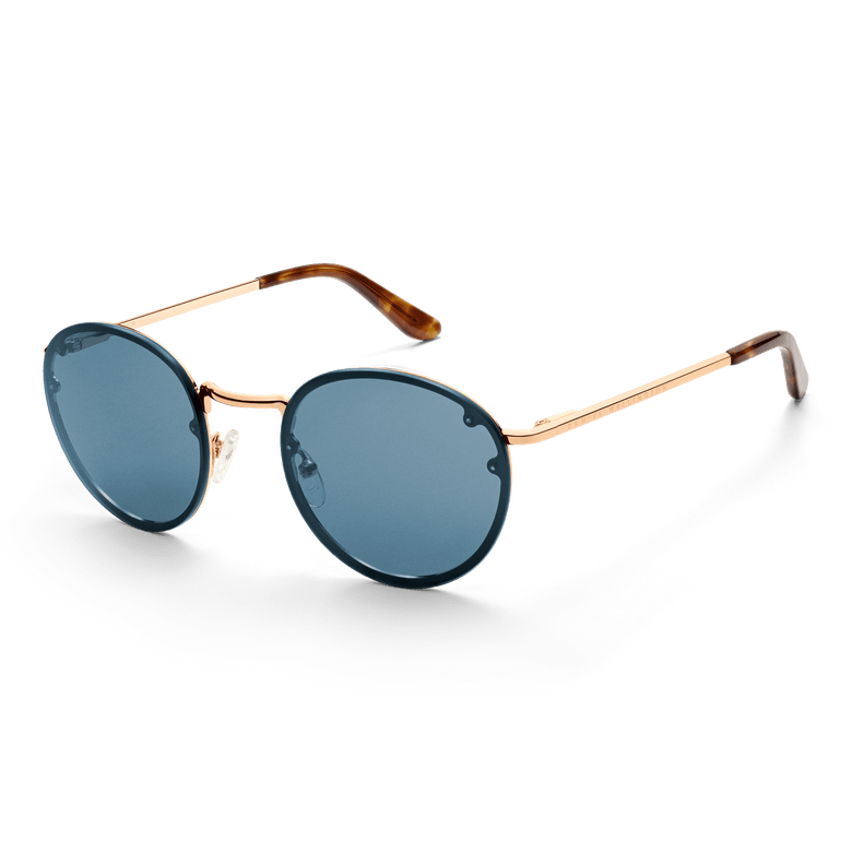 Arch Steel Blue Rose Gold sunglasses featuring round blue UV400 nylon lenses, a rose gold plated stainless steel frame, and tortoiseshell acetate temple tips, shown at an angle.