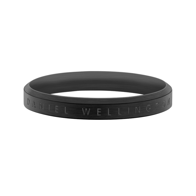 Classic Ring Black featuring a brushed stainless steel band with Daniel Wellington engraved branding, showcasing its minimalist design and deep black finish suitable for both men and women.
