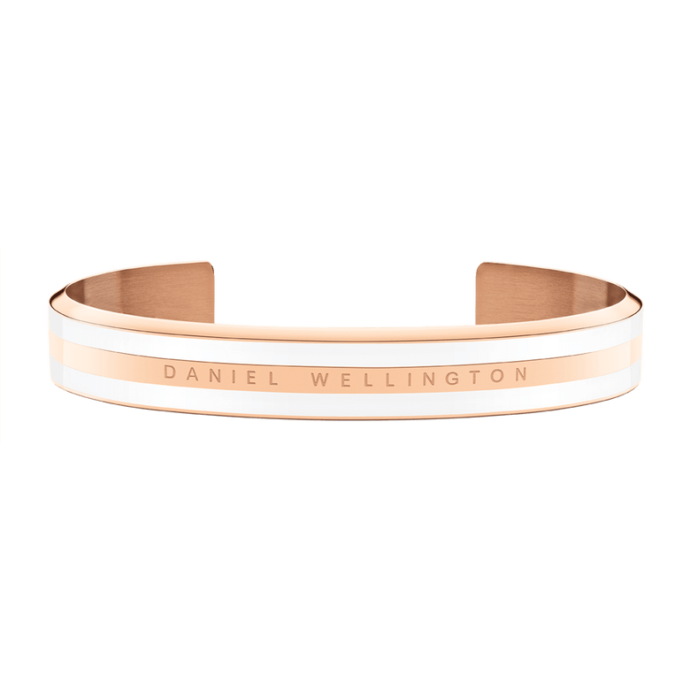 Rose gold and satin white enamel cuff bracelet with Daniel Wellington branding, featuring a slim, modern silhouette ideal for layering or wearing solo.