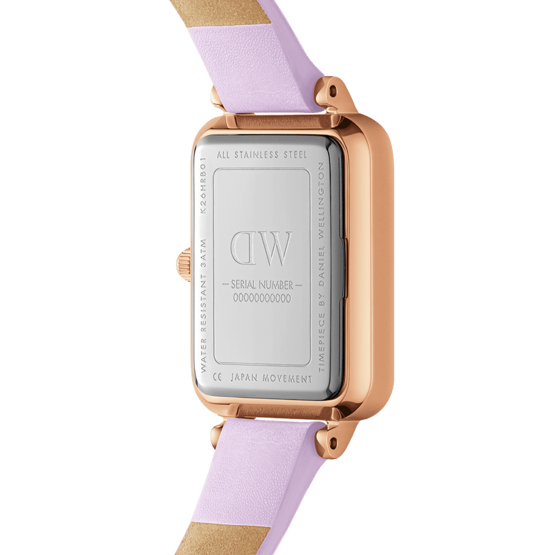 Back view of the Quadro Lavender MOP Rose Gold ladies watch, showing the stainless steel case, rose gold finish, and pastel purple leather strap with engraved details and Japanese movement.