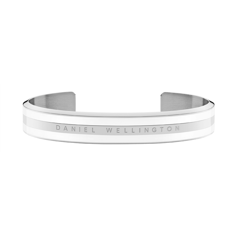 Emalie Bracelet Silver displays a modern open cuff silhouette with polished silver and satin white enamel, featuring Daniel Wellington branding engraved along the front.