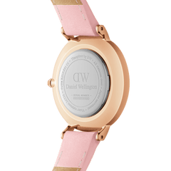 Close-up of the back of the Petite Cherry Blossom ladies watch, showing the rose gold plated stainless steel case and pastel pink leather strap, highlighting its quality craftsmanship and engraved details.